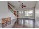 Welcoming living room with staircase and hardwood floors at 9948 Timber Oaks Ct # 14, Orlando, FL 32817