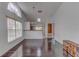 Open-concept living room featuring hardwood floors and bright natural light at 9948 Timber Oaks Ct # 14, Orlando, FL 32817