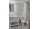 Updated bathroom with modern fixtures, vanity storage, and beautiful tile at 320 Forestway Cir # 107, Altamonte Springs, FL 32701