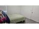 Bedroom with a light green duvet and modern flooring at 320 Forestway Cir # 107, Altamonte Springs, FL 32701