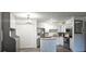 Modern kitchen with stainless steel appliances and ample cabinet space at 320 Forestway Cir # 107, Altamonte Springs, FL 32701