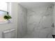 Modern bathroom with new tile, fixtures, and glass shower enclosure at 107 Laurel Oak Dr, Longwood, FL 32779