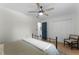 Comfortable bedroom featuring wood floors, blue accent wall, and a ceiling fan at 107 Laurel Oak Dr, Longwood, FL 32779