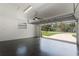 Spacious two car garage with epoxy floors and ample storage area at 107 Laurel Oak Dr, Longwood, FL 32779