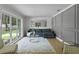 Inviting living room with large window, gray wainscoting and a comfortable sectional sofa at 107 Laurel Oak Dr, Longwood, FL 32779