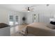 Lovely main bedroom with access to ensuite bathroom and private patio at 107 Laurel Oak Dr, Longwood, FL 32779