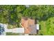 Birds eye view of the house showing the roof, driveway, and landscaping at 111 Main St, Windermere, FL 34786