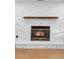 Close-up of the fireplace in the living room at 111 Main St, Windermere, FL 34786