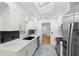 Contemporary kitchen with stainless steel appliances and modern finishes at 111 Main St, Windermere, FL 34786