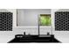 Modern kitchen sink highlighted by a hexagon backsplash and natural light at 111 Main St, Windermere, FL 34786