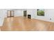 Spacious living room featuring wood flooring and a fireplace at 111 Main St, Windermere, FL 34786