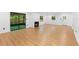Spacious living room featuring wood flooring and a fireplace at 111 Main St, Windermere, FL 34786