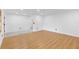 Bright living room boasts light wood floors and neutral walls at 111 Main St, Windermere, FL 34786