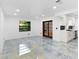 Bright living room features tile flooring and recessed lighting at 111 Main St, Windermere, FL 34786
