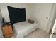 Cozy bedroom showcasing a comfortable bed and simple decor for a relaxed atmosphere at 11418 Ashboro Dr, Orlando, FL 32837
