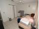 Spacious bedroom featuring a ceiling fan and closet space for ample storage at 11418 Ashboro Dr, Orlando, FL 32837