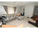 Comfortable living space with tile flooring, ample natural light, and cozy seating at 11418 Ashboro Dr, Orlando, FL 32837