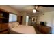 Cozy bedroom with a double bed, closet, and natural light at 1292 Nadine Dr, Deltona, FL 32738