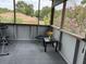 Enclosed porch with serene outdoor views provides a flexible living space for relaxing or exercising at 1292 Nadine Dr, Deltona, FL 32738