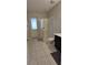 Modern bathroom featuring a glass-enclosed shower, toilet, and tile floors at 1544 Nassau Point Trl, Kissimmee, FL 34747