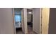 View of 2 bedrooms with carpet, neutral walls, and a closet at 1544 Nassau Point Trl, Kissimmee, FL 34747