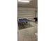 Spacious garage with a ping pong table and pool table, with plenty of room for activities at 1544 Nassau Point Trl, Kissimmee, FL 34747