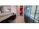 Bright home office with a granite desktop, window, and tile floors at 1544 Nassau Point Trl, Kissimmee, FL 34747