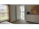 Cozy bedroom with natural light, neutral tones, and ample space, creating a comfortable and inviting atmosphere at 2002 Punch Bowl Ave, Davenport, FL 33837