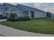 Attractive single-Gathering home featuring a well-manicured lawn and inviting curb appeal at 2002 Punch Bowl Ave, Davenport, FL 33837