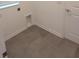 The laundry room has tile floors, a utility sink and is ready for your washer and dryer at 2002 Punch Bowl Ave, Davenport, FL 33837