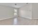 Bedroom with neutral walls, window and tile flooring at 2044 Hillview Cir, Deltona, FL 32738
