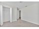 Spacious bedroom shows a large closet and doorway to another room at 2044 Hillview Cir, Deltona, FL 32738