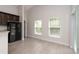 Spacious kitchen with modern appliances and a bright dining area perfect for Gathering meals and entertaining guests at 2044 Hillview Cir, Deltona, FL 32738