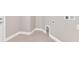 Clean laundry room with a pet door and tile flooring at 2044 Hillview Cir, Deltona, FL 32738