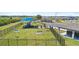 Wide shot of the community park featuring a playground, picnic area, and green space for outdoor activities at 2227 Chris Dr, Winter Haven, FL 33884