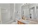 Bathroom with a shower-tub combination and bright white features creating a refreshing space at 2343 Caravelle Cir, Kissimmee, FL 34746