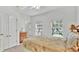 Serene bedroom with views from two windows for a light and airy feel at 2343 Caravelle Cir, Kissimmee, FL 34746