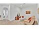 Comfortable living room with a cozy sofa, TV, and a decorative table, perfect for relaxing and entertaining at 2343 Caravelle Cir, Kissimmee, FL 34746