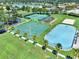 The community boasts various sports courts, including tennis, basketball, and hockey, with palm trees lining the sidewalks at 2359 Baronsmede Ct, Winter Garden, FL 34787