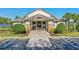 The Stoneybrook West Town Center features a handicap ramp and handicap parking, as well as well-maintained landscaping at 2359 Baronsmede Ct, Winter Garden, FL 34787