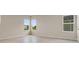Bedroom with lots of natural light with tiled flooring and neutral walls at 2372 Orchid Dr, Davenport, FL 33837