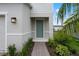 Charming home entrance with a brick walkway and inviting curb appeal at 2372 Orchid Dr, Davenport, FL 33837