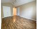 Bedroom with hard wood floors, ceiling fan and white doors for easy access at 2548 Galliano Cir, Winter Park, FL 32792