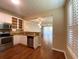 Open kitchen with stainless steel appliances, granite countertops, and view to the living area at 2548 Galliano Cir, Winter Park, FL 32792