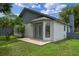 Backyard with a patio and lush greenery at 3107 Ash Park Loop, Winter Park, FL 32792