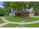 Charming home with brick accents, mature landscaping, and well-maintained lawn, in a peaceful setting at 3107 Ash Park Loop, Winter Park, FL 32792