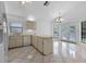 Bright kitchen with ample countertop space, modern appliances, and plenty of cabinet storage at 3107 Ash Park Loop, Winter Park, FL 32792