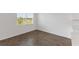 Bright and airy dining area with tile flooring and a window overlooking the landscape at 3144 Suraj Cir, Tavares, FL 32778