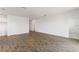 Spacious living room features tile floors, bright neutral paint, and natural light at 3144 Suraj Cir, Tavares, FL 32778