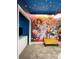 Fun 'Toy Story' themed bedroom with blue ceiling with stars and cartoon murals at 3191 Paradox Cir # 102, Kissimmee, FL 34746